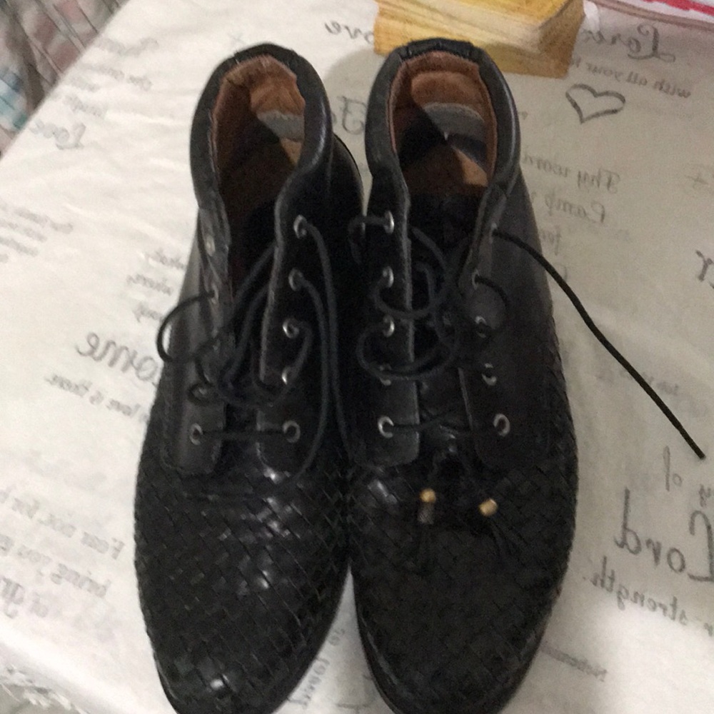 Black pair of ankle booths